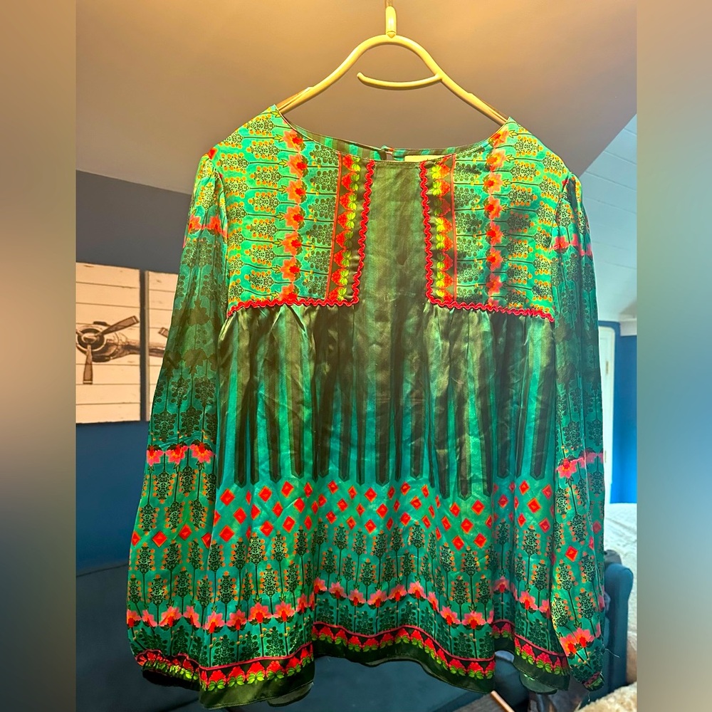 Anthropology flowy silk top. Style still sold in store not this pattern.